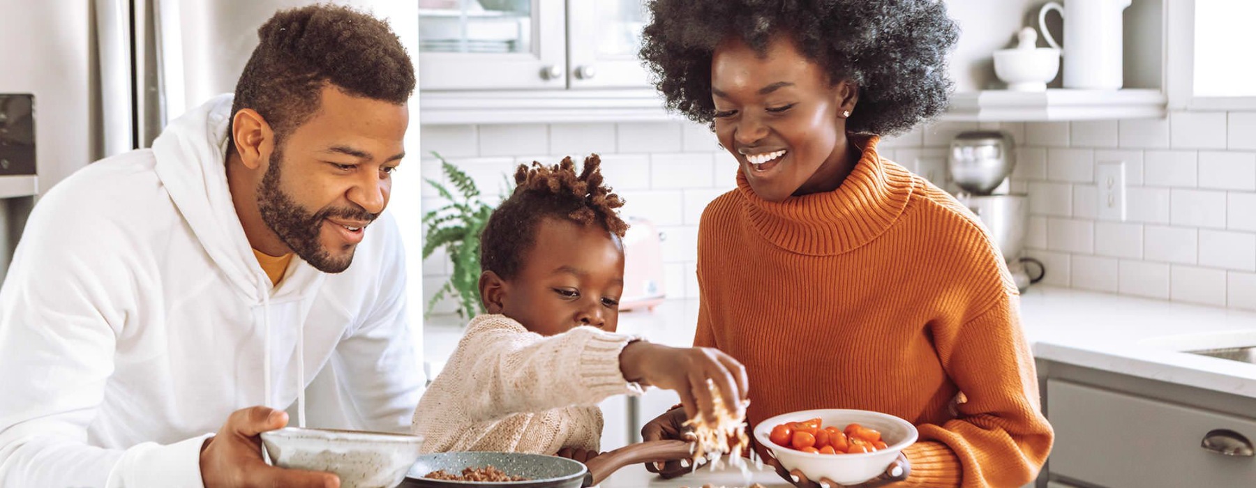 a family cooking together