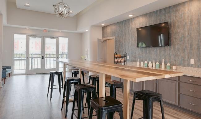 clubhouse kitchen with table and chairs